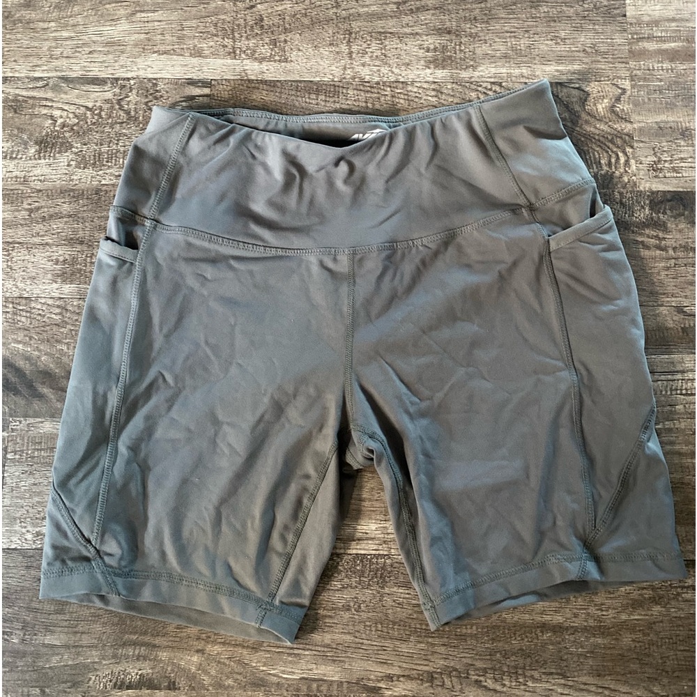 Dark green Avia athletic biker shorts with side pockets